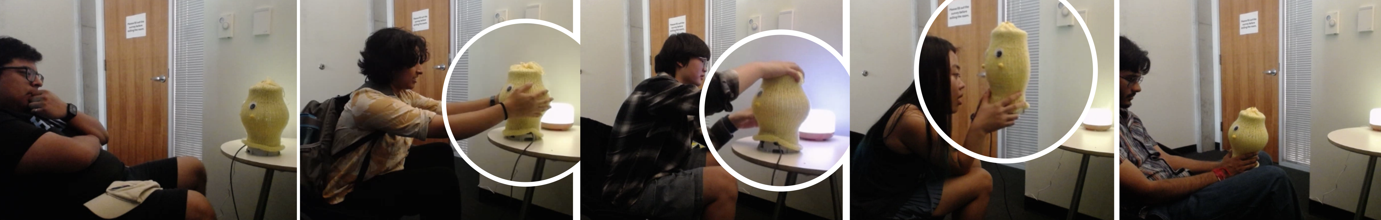 People holding, tilting, and closely engaging with Lantern during sensory room interaction.